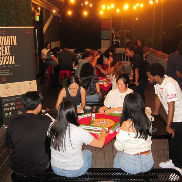 Mahjong tables on the patio at Buteco EAV